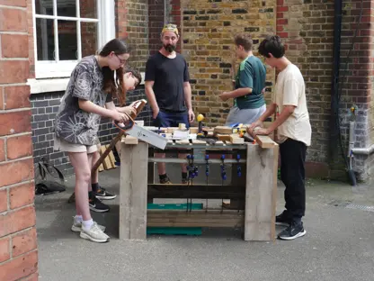 Young people doing woodwork