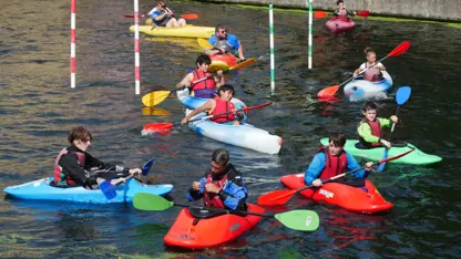 Group of young people kayaking